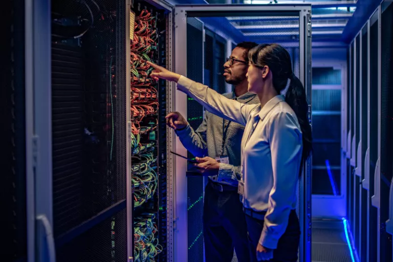 Two people in data center